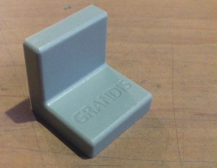 Накладка GRANDIS серая пластик. к уголку 25х25 (200)